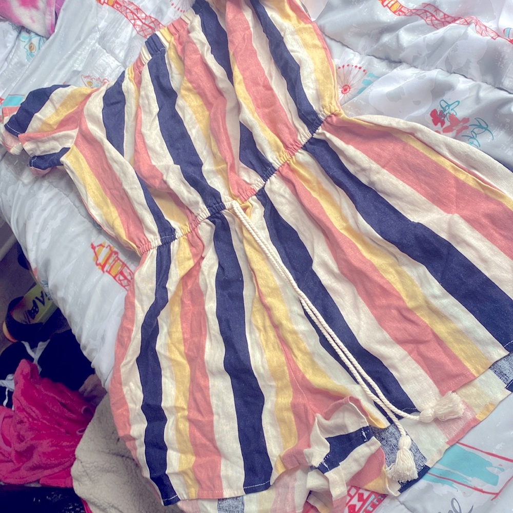 Romper it is new the tag is still on it